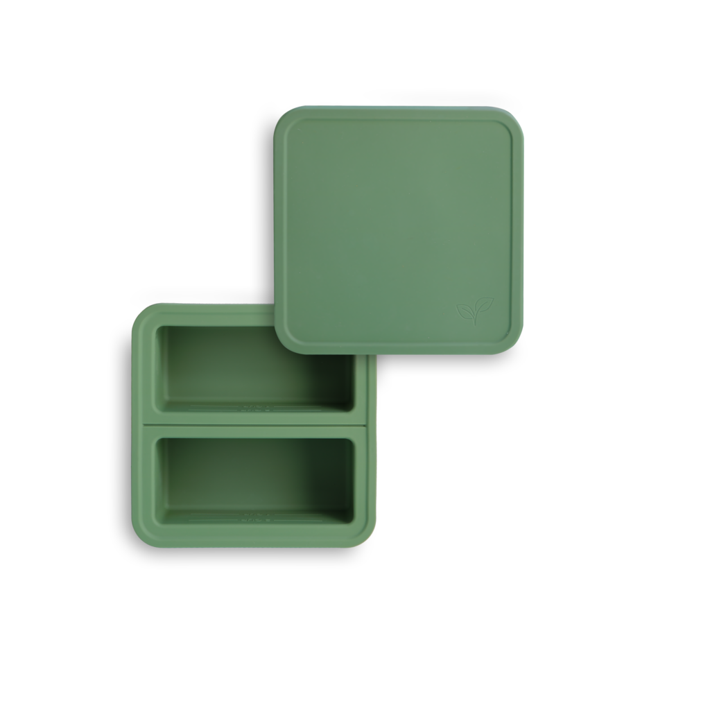 FDA - approved silicone freezer trays in two-portion and four -portion sizes,filled with home-cooked meals, and designed for easy portioning and freezing.