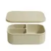 Top view of a mushroom - coloured silicone bento box with divided compartments for organising lunch,lightweight and durable, designed for easy, stress-free everyday packing.