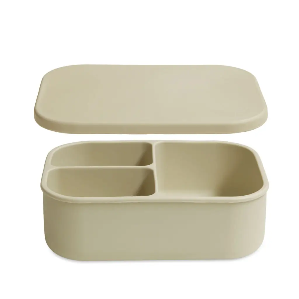 Top view of a mushroom - coloured silicone bento box with divided compartments for organising lunch,lightweight and durable, designed for easy, stress-free everyday packing.